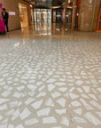 White marble irregular terrazzo used on the floor of the shopping mall