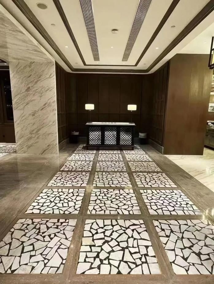 Terrazzo used in the hotel lobby floor, white marble paved
