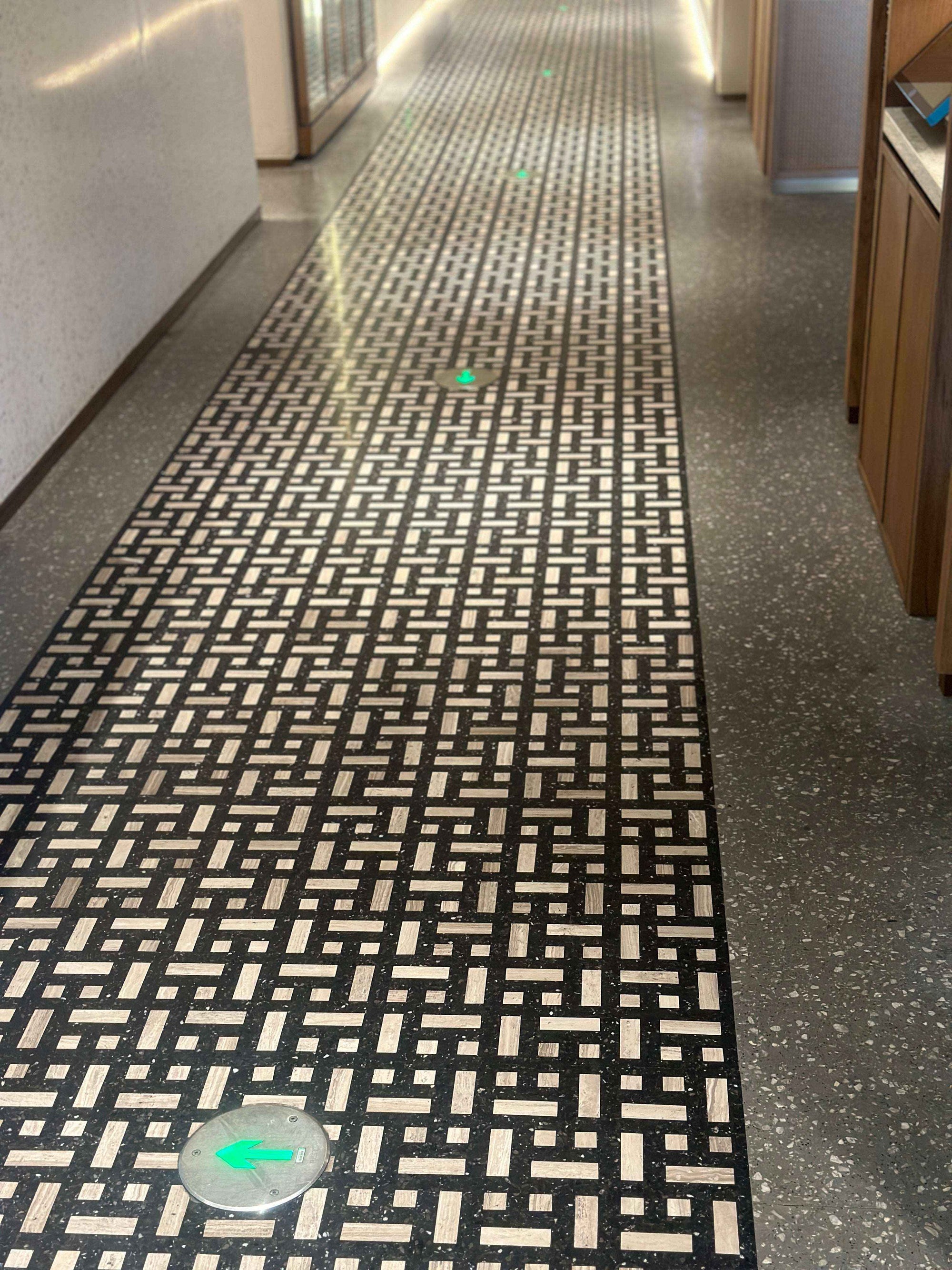 Black and white checkered terrazzo used on the floor of indoor hot pot restaurants