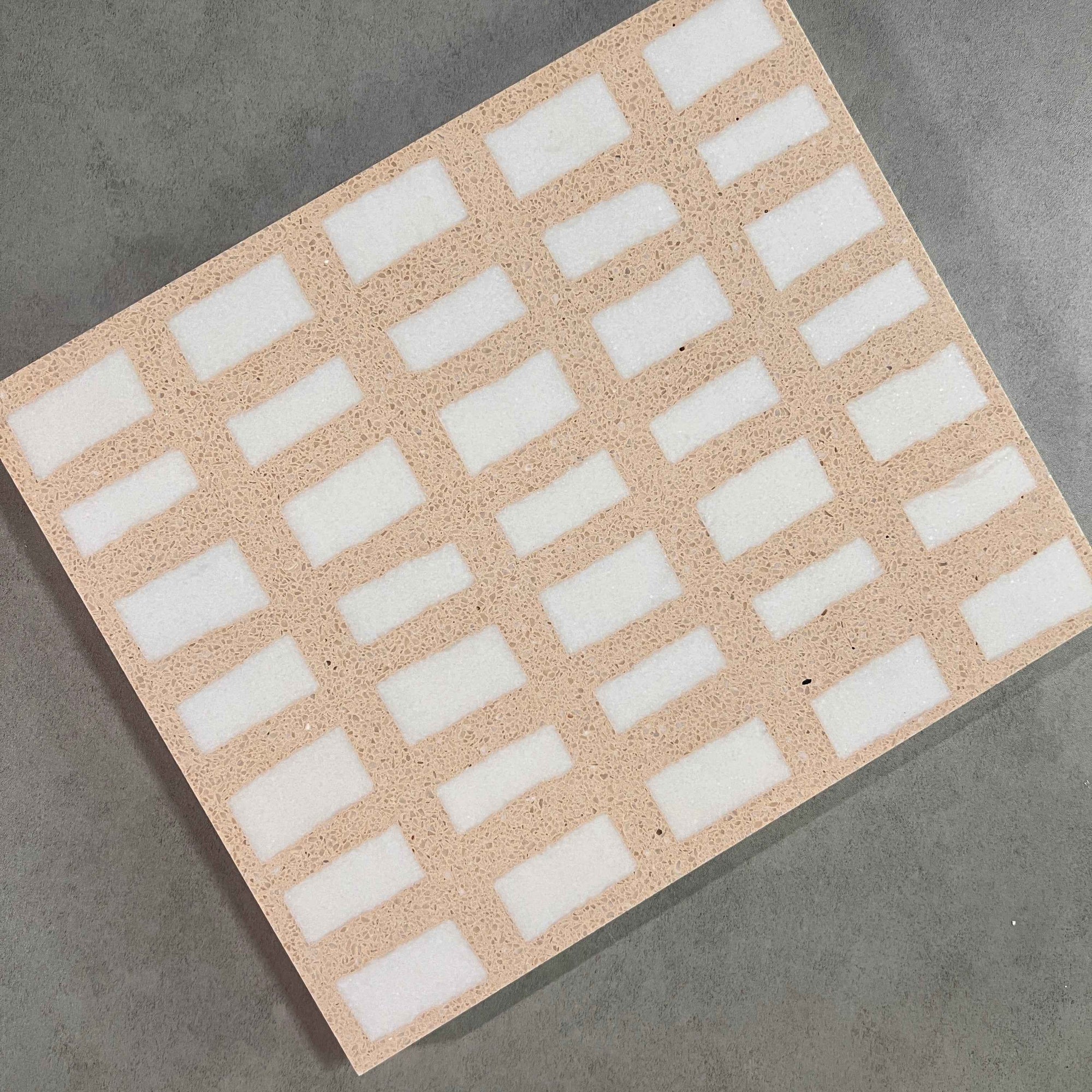 White marble terrazzo with yellow-pink background