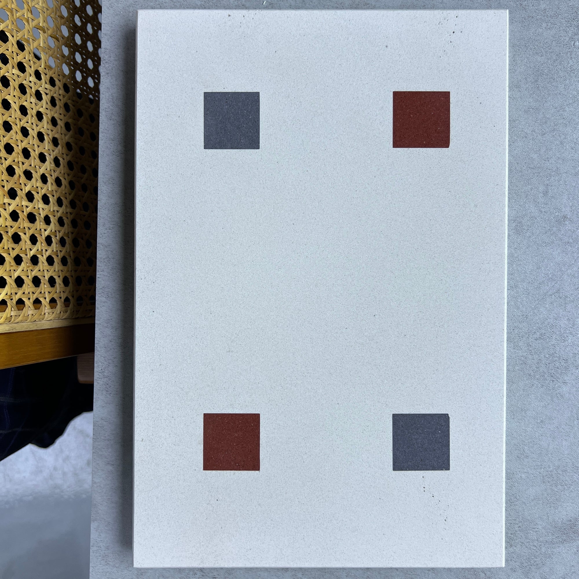 Gray and red squares are staggered with marble terrazzo