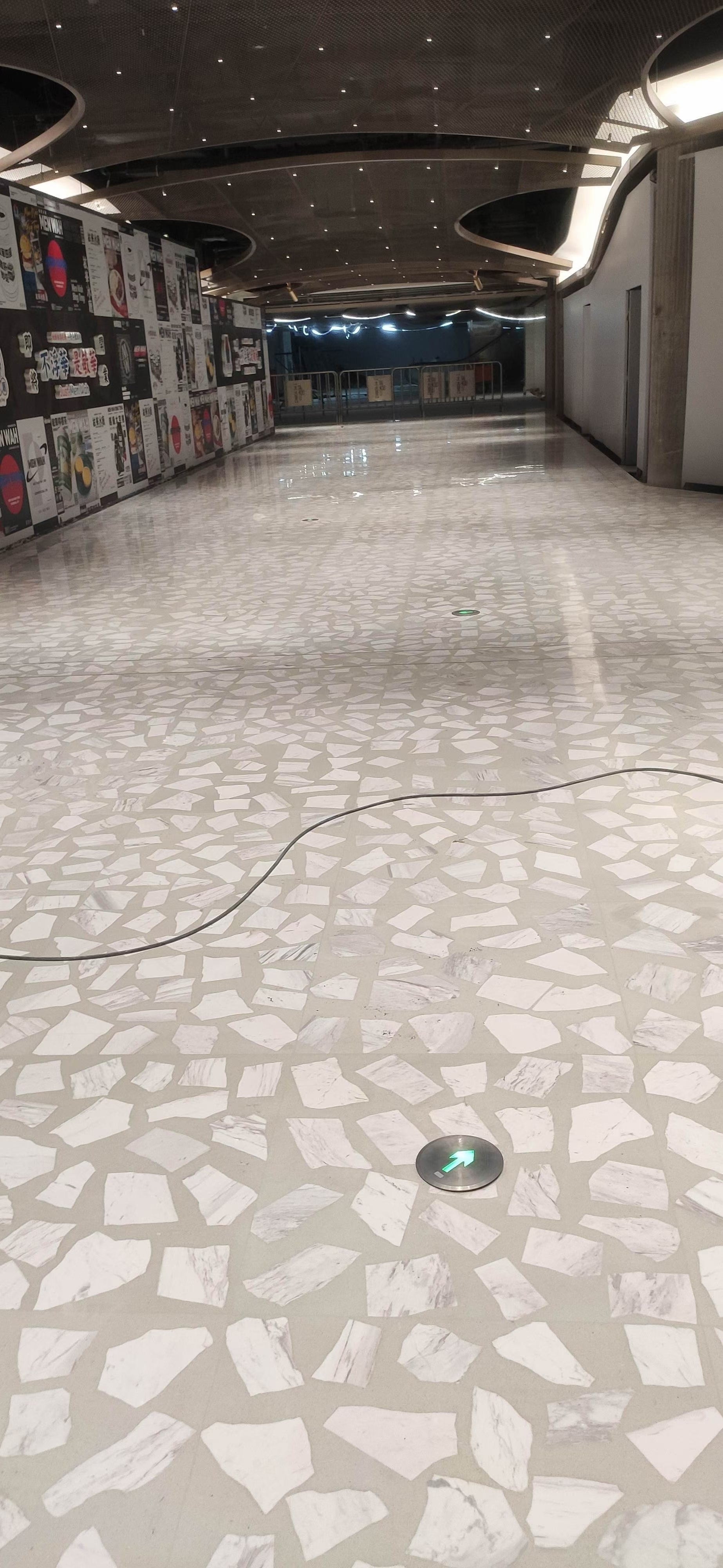 White marble irregular terrazzo used on the floor of the shopping mall